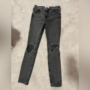 Free People acid wash busted knee jeans